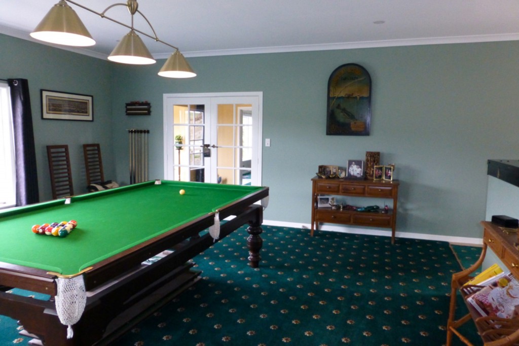 Pool Room with door through to stairwell